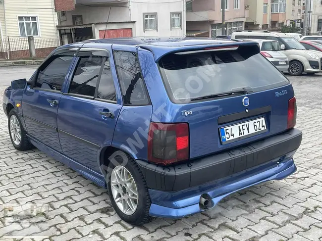 FIAT TIPO 1.6 car in metallic blue, excellent condition.