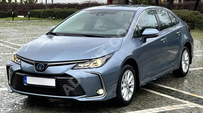 COROLLA_HYBRID car with no changes over a distance of 50,000 km