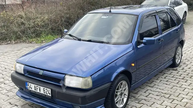 FIAT TIPO 1.6 car in metallic blue, excellent condition.