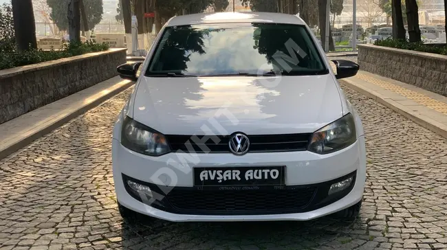 Volkswagen Polo car in excellent condition with a tablet screen at no cost from AVŞAR.