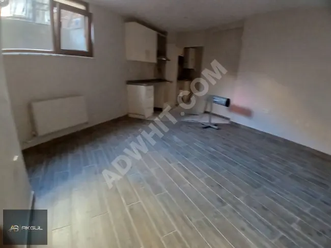 2+1 apartment on the ground floor near the metro from AKGÜL