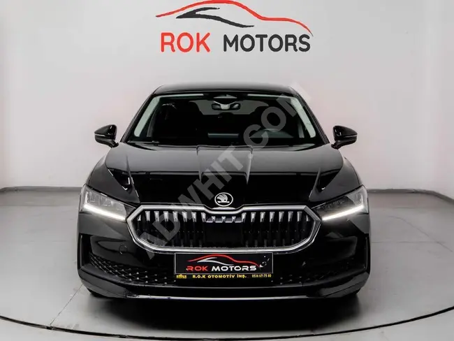 Black Skoda SuperB 2024 model car with a down payment of 500,000 Turkish Lira and a repayment period of 24 months.