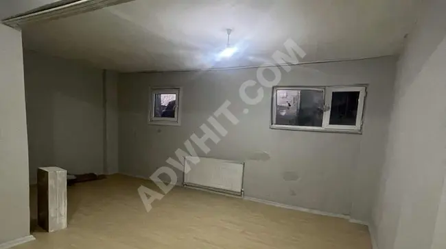 A 3+1 apartment for rent with gas heating, semi-basement, from BİEN GYO company.