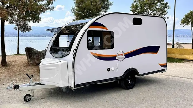 2024 Caravan from GÖKHAN KARAVAN equipped with a foldable bunk bed, solar panel, tent, Webasto heating system, TV, and toilet.