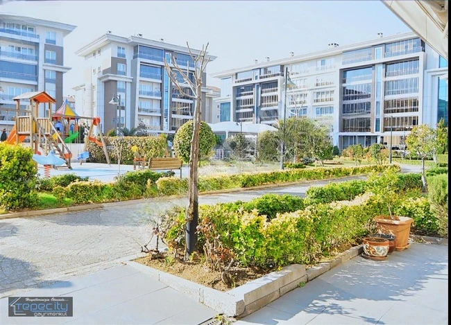 3+1 apartment on the ground floor for sale in EVİZA KONAKLARI