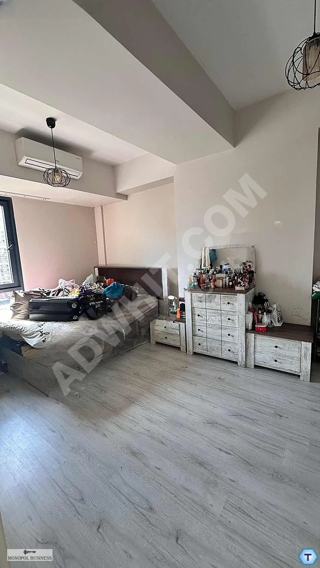 1+1 apartment for urgent sale at an opportunity price with a view of the complex garden within the VİAPORT VENEZİA residential complex.