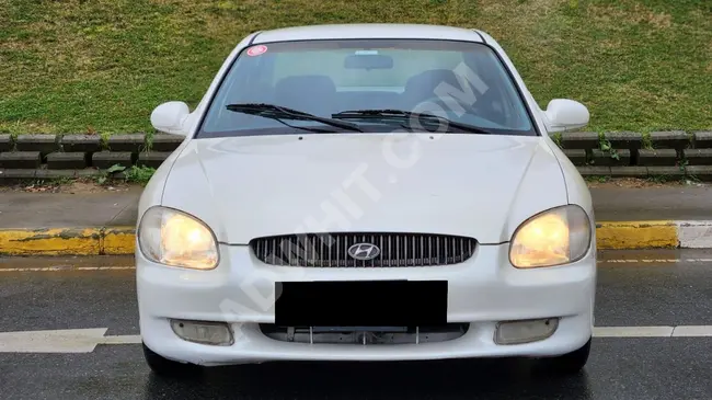 سيارة HYUNDAİ SONATA  موديل  1999  ناقل حركة  يدوي بنزين مع غاز مسال