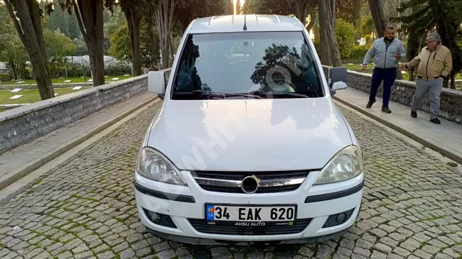 OPEL COMBO 1.7 CITY PLUS model 2008 with dual air conditioning and two sliding doors.