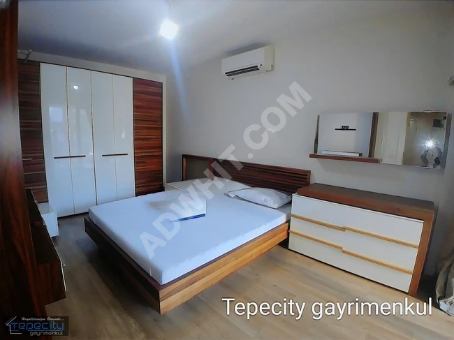 2+1 furnished apartment with an American kitchen for rent in İKEBANA EVLERİ