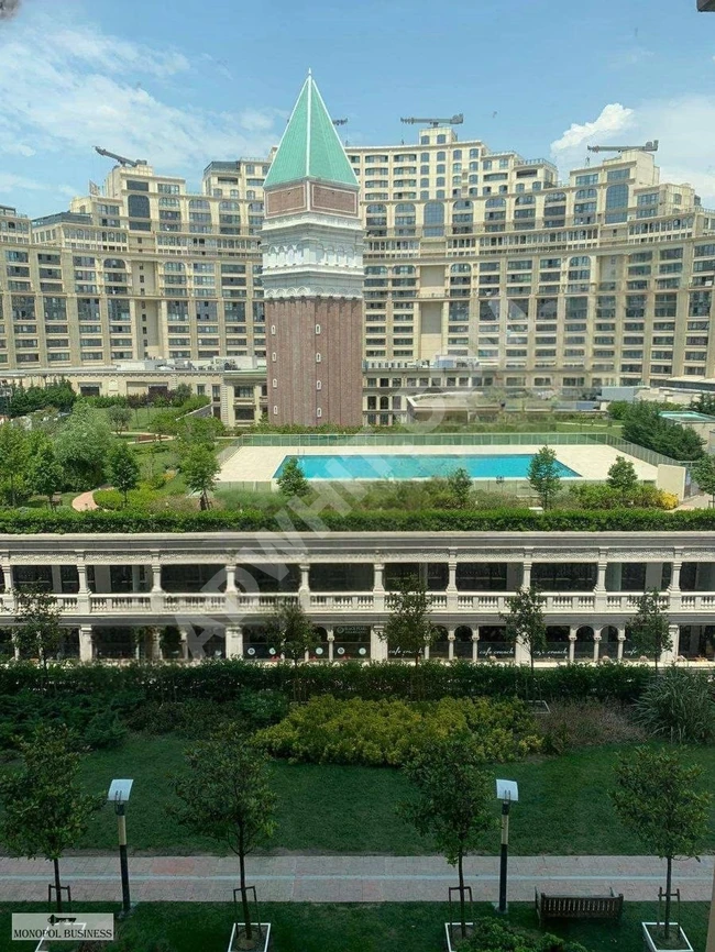 1+1 apartment for sale with a view of the complex gardens, including additional accessory costs.