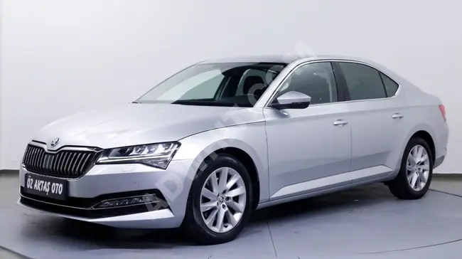 Skoda Superb Premium موديل 2021  لم تقطع سوى 87,000 كم، صيانة منتظمة مع فاتورة بنسبة 20%!