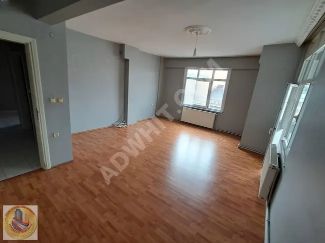 2+1 apartment with an open kitchen in a central location in TUZLA AYDINLI