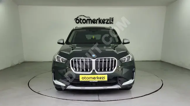 BMW X1 20i sDrive model 2023 with the possibility of installment payment over 12 months using a credit card - from OTOMERKEZİ