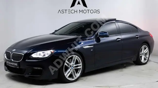 BMW 6.40D X DRIVE M SPORT car in navy and brown color with a distance of 140,000 km