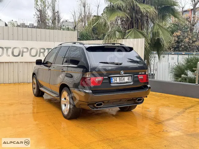 سيارة BMW X5 3.0D 4X4 موديل 2005 - بسقف زجاجي بمسافة 390 KM