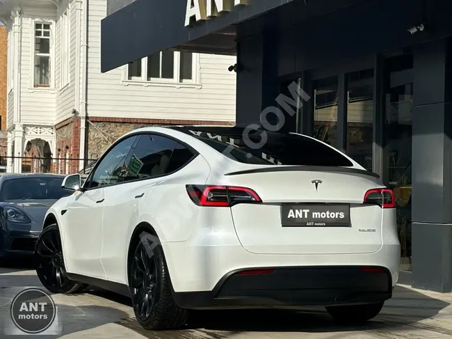 Tesla Model Y Performance Model 2023 without defects + Driver Assistance + White Leather + 21-inch Wheels