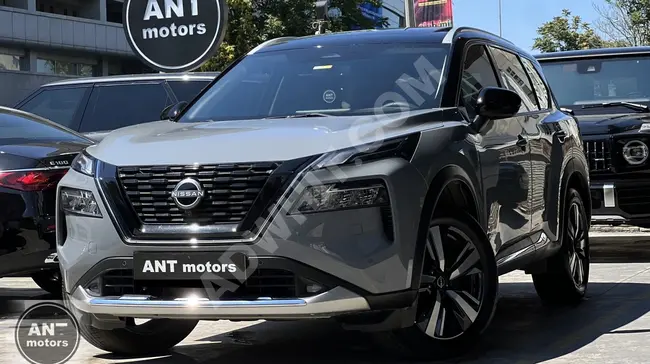 NISSAN X-TRAIL 1.5 E 4ORCE PLATINUM PREMIUMموديل 2022 بدون عيوب - نظام صوت BOSE