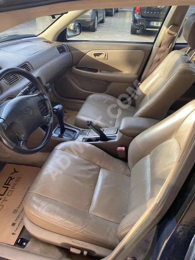 سيارة  TOYOTA CAMRY GX 3.0 V6موديل 1999 لا مثيل لها 97000كم منLUXURY MOTORS