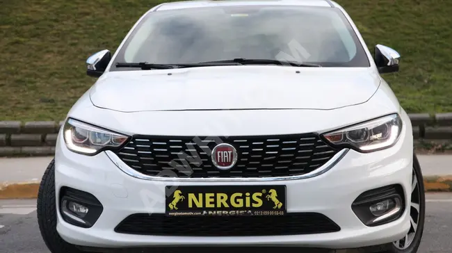 FIAT EGEA car with blue seats, full LED rear view lights, navigation from NERGİS AUTOMOTIVE.