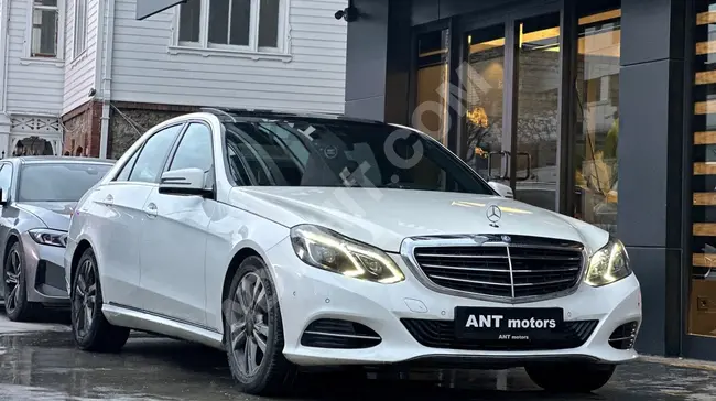 سيارة MERCEDES E 180 ELITE موديل 2015 - حزمة حصرية خارجية + سقف زجاجي