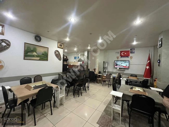 Commercial shop for sale with an area of 100 square meters featuring a garden and spacious area on AŞIKVEYSEL Street.