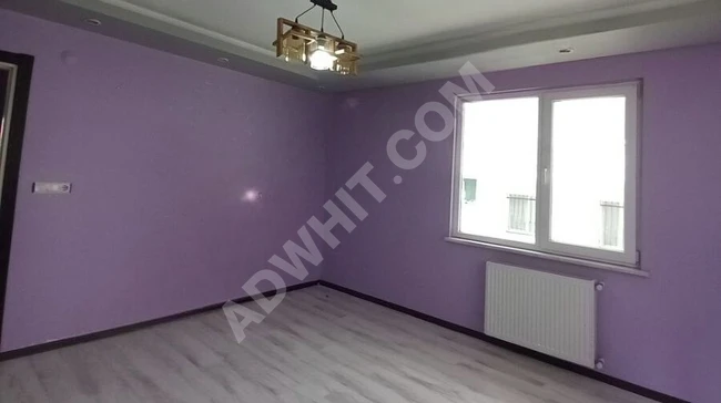 Spacious 2+1 apartment with a balcony in a central location in Gürpınar.