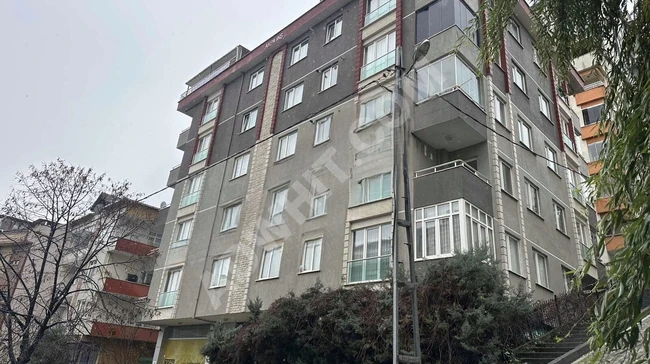 Commercial shop for sale with an area of 100 square meters featuring a garden and spacious area on AŞIKVEYSEL Street.