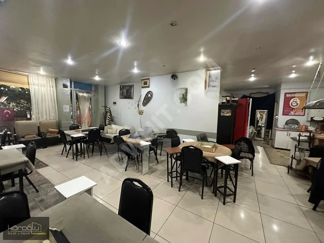 Commercial shop for sale with an area of 100 square meters featuring a garden and spacious area on AŞIKVEYSEL Street.