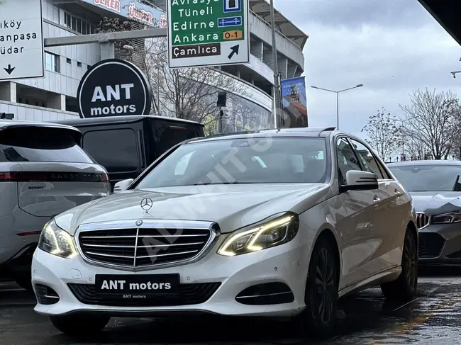 سيارة MERCEDES E 180 ELITE موديل 2015 - حزمة حصرية خارجية + سقف زجاجي