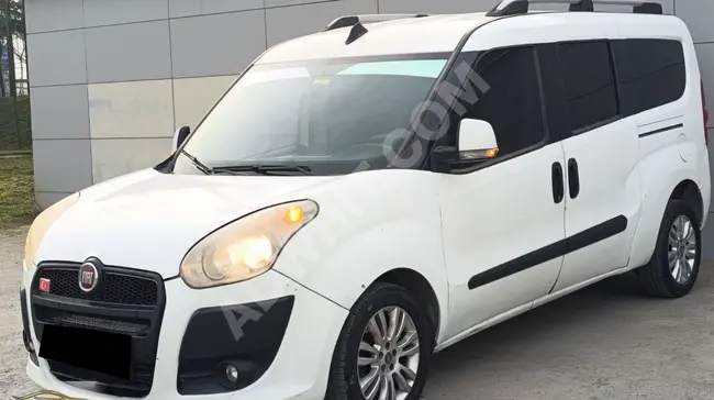 من MNK AUTO، سيارة Fiat Doblo عائلية طويلة تم صيانتها بالكامل - قرض والمقايضة متاحة .