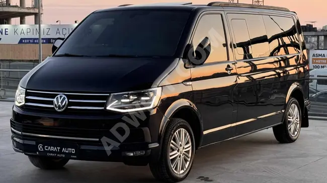 Volkswagen Caravelle model 2017 with DSG transmission, 204 horsepower, sunroof, rear view