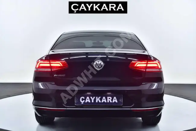 Volkswagen Passat Car, model 2019, with 125,000 km, automatic diesel, black color, with beige interior.