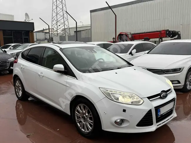 سيارة Ford Focus TITANIUM  ديزل بقوة 115 حصان فتحة سقف تدفئة مقاعد  وقرض بنسبة فائدة 1.99