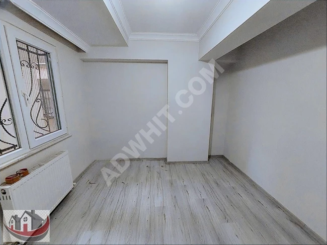 GÜNEYDEN YENİ BİNADA AYRI MUTFAKLI ARA KAT 2+1.70M2 DAİRE