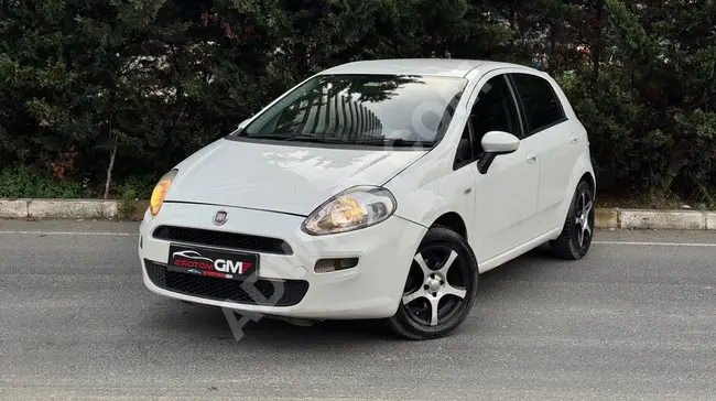 PUNTO 1.2 POPSTAR car model 2014 with a mileage of 128,000 kilometers.