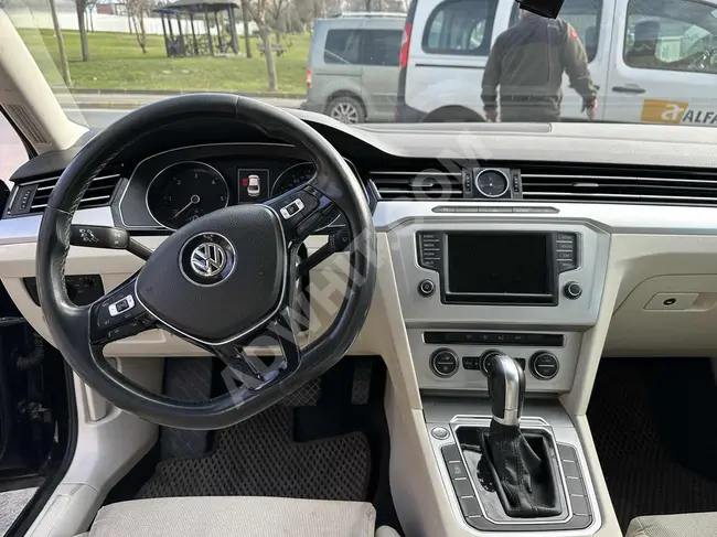 VOLKSWAGEN PASSAT with the option to pay in 12-month installments for credit card holders. Black color with beige exterior, no modifications, low mileage.