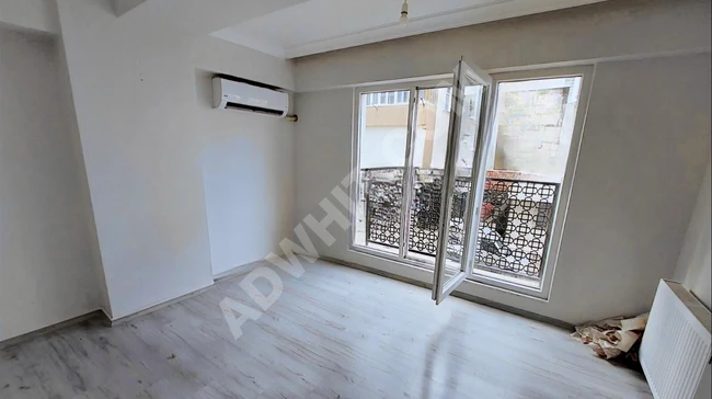 GÜNEYDEN YENİ BİNADA AYRI MUTFAKLI ARA KAT 2+1.70M2 DAİRE