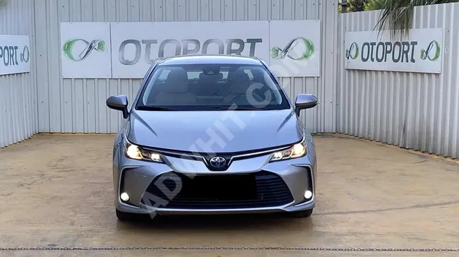 Toyota Corolla 2021 model, hybrid lane keeping system, rear view, autonomous driving, CARPLAY