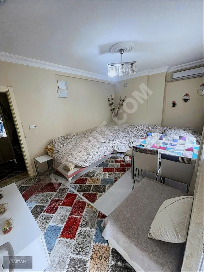 2+1 apartment with a private entrance and garden, 90 square meters, for rent from Taştan Emlak.