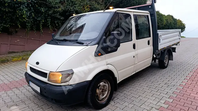 شاحنة FORD TRANSİT 350 M  موديل 2004، كابينة مزدوجة، شاحنة مسطحة، بمسافة 200 ألف كم