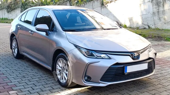 سيارة TOYOTA COROLLA 1.8 HYBRİD موديل 2021- حزمة DREAM - خالية من العيوب والصبغ