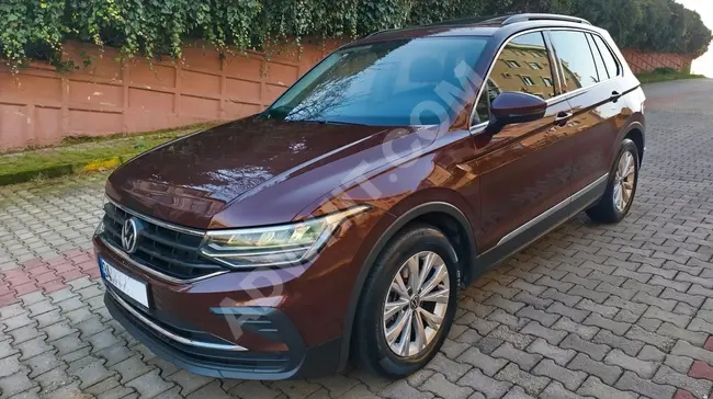 سيارة VW TİGUAN 1.5 TSI  موديل 2020 بقوة 150 حصان، لون LANSMAN مع سقف زجاجي بدون طلاء.