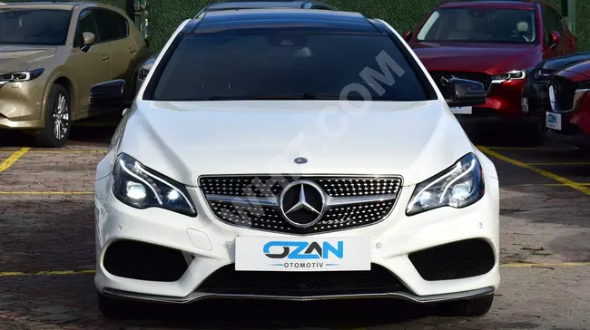 MERCEDES E250 CGI COUPE car, 2011 model, with a 2016 appearance.