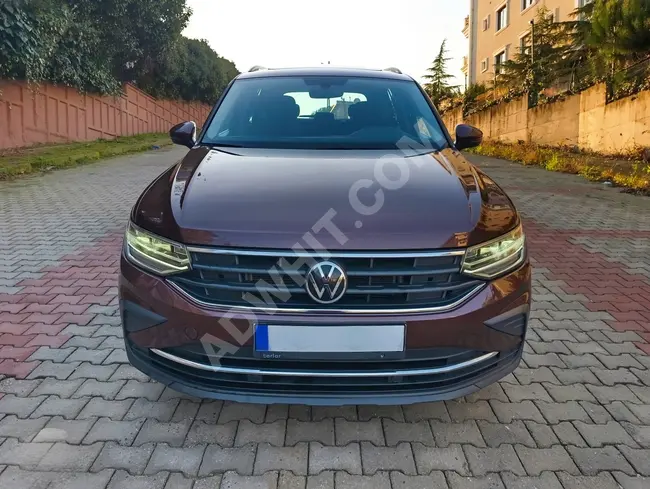 VW TİGUAN 1.5 TSI car, 2020 model with 150 horsepower, LANSMAN color with a glass roof, no paint.