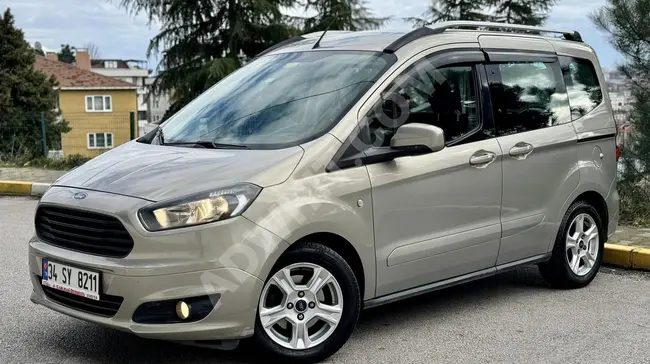 FORD TOURNEO COURIER DELUX 1.6TDCİ car, model 2017 with a 30% down payment and 95 horsepower.