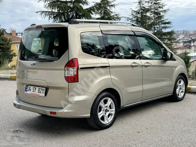 FORD TOURNEO COURIER DELUX 1.6TDCİ car, model 2017 with a 30% down payment and 95 horsepower.