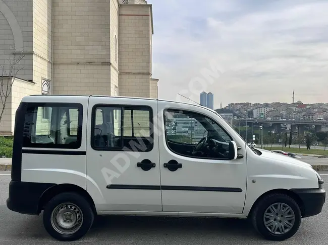 FIAT DOBLO COMBI DYNAMIC 1.9 JTD car, model 2004, loan with an interest rate of 1.99%.