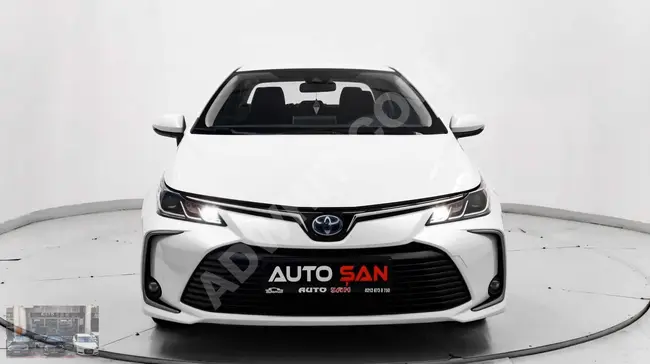 سيارة Corolla 1.8 Hybrid Dream موديل 2021 - مع شحن لاسلكي - صيانة في الخدمة المعتمدة