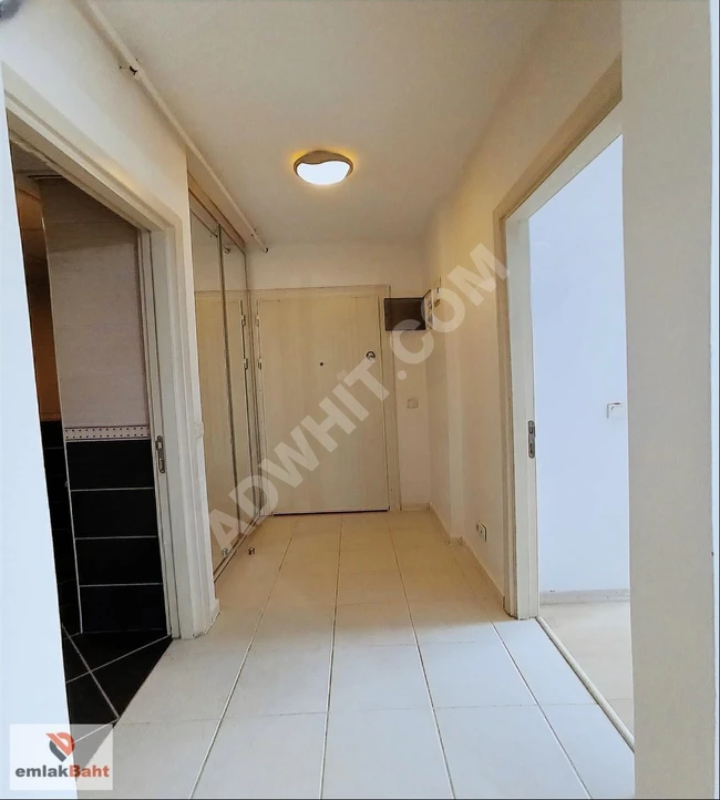 1+1 apartment with a size of 60 square meters on the ground floor in the ATAKENT SOYAK OLYMPIA CITY complex