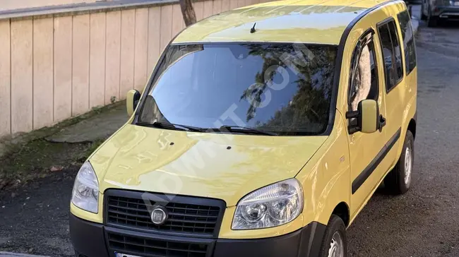 سيارة Fiat Doblo بنزين / غاز مسال  بمقاعد أصلية